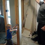 helping daddy tear out the front hall closet