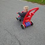 riding the tricycle without help, he can reach the peddles now