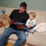 Uncle Greg reading Isaac a story
