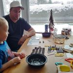 Greg teaching Isaac about following instructions and organization