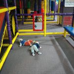 just lying on the floor, kicking Luca in the head