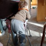 Sigh...Asher can climb into this highchair...