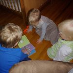 Isaac reading the kids a story