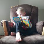 reading by himself!