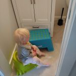 sitting with Isaac on the potty