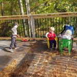 Isaac working hard to clean the deck