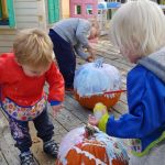 two activities from one pumpkin, painting and then carving