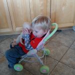 Asher loves to chill in the stroller