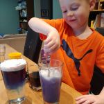 playing with coloured water and shaving cream