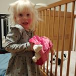 putting the doll to bed