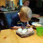 examining his crystals