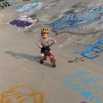 Asher loves the coaster bike