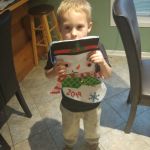 Isaac finished sewing his stocking